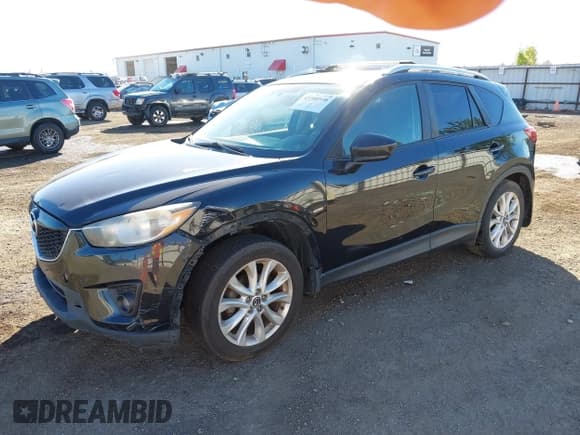 ✅ 2013 Mazda CX-5 Grand Touring • VIN: JM3KE2DE5D0130378 • Lot: 43388936. Wystawiony na IAAI z przebiegiem Nie podano. Bezpłatny archiwum sprzedaży aukcyjnych z USA i szczegółowy raport historii pojazdu na DreamBid. Zdjęcie 2.