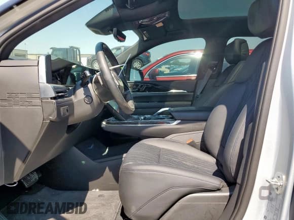 ✅ 2025 Cadillac ESCALADE IQ • VIN: 1GYTEEKL3SU101378 • Lot: 71510755. Listed on Copart with 12,080 mi. Free auction sales archive from the USA and detailed vehicle history report at DreamBid. Image 7.