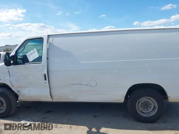 ✅ 2013 Ford Econoline Cargo Commercial • VIN: 1FTNE1EW1DDB34038 • Lot: 42785150. Listed on IAAI with 306,839 mi. Free auction sales archive from the USA and detailed vehicle history report at DreamBid. Image 14.