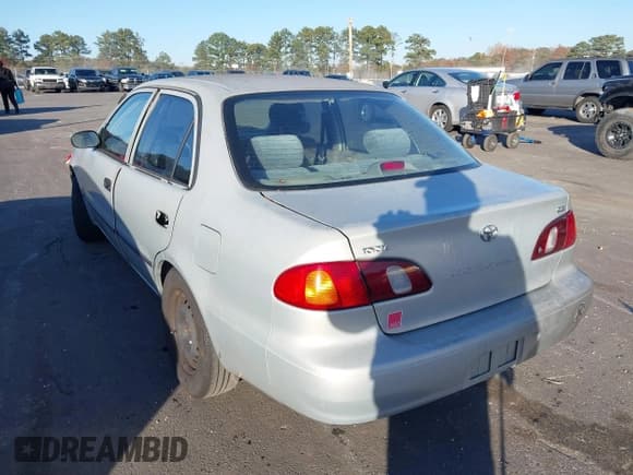 ✅ 2000 Toyota Corolla VE • VIN: 1NXBR12E9YZ367282 • Lot: 43682783. Listed on IAAI with 245,007 mi. Free auction sales archive from the USA and detailed vehicle history report at DreamBid. Image 3.