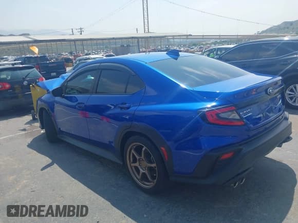 ✅ 2022 Subaru WRX • VIN: JF1VBAA64N9002223 • Lot: 42159263. Listed on IAAI with 29,730 mi. Free auction sales archive from the USA and detailed vehicle history report at DreamBid. Image 3.