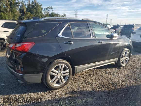 2018 Chevrolet Equinox Premier z VIN 2GNAXNEX2J6229525, wystawiony jako Copart lot #89667055 z przebiegiem 130 483 mil mil oraz Szkoda całkowita • Salvage title. Historia ofert i sprzedaży dostępna na DreamBid. Obrazek 3.