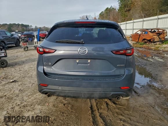 ✅ 2023 Mazda CX-5 S Preferred • VIN: JM3KFBCM9P0125954 • Lot: 94697375. Listed on Copart with 60,390 mi. Free auction sales archive from the USA and detailed vehicle history report at DreamBid. Image 6.