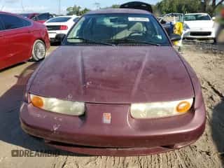 2001 Saturn SL z VIN 1G8ZK52711Z324512, wystawiony jako Copart lot #73812924 z przebiegiem 121 284 mil mil oraz Szkoda całkowita • Salvage title. Historia ofert i sprzedaży dostępna na DreamBid. Obrazek 5.