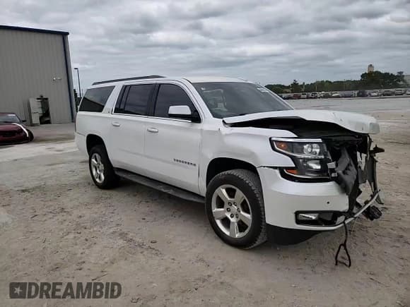 ✅ 2016 Chevrolet Suburban LT • VIN: 1GNSCHKC7GR413410 • Lot: 48401914. Wystawiony na Copart z przebiegiem 192 168 mil. Bezpłatny archiwum sprzedaży aukcyjnych z USA i szczegółowy raport historii pojazdu na DreamBid. Zdjęcie 12.