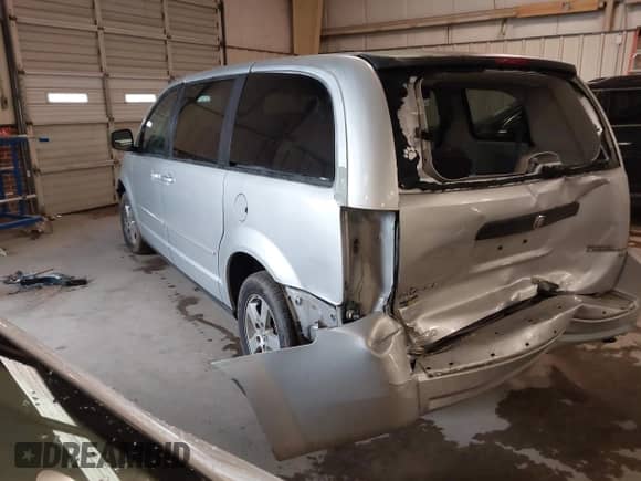 2010 Dodge Grand Caravan SE with VIN 2D4RN4DE3AR341120, listed as a IAAI auction lot 41617770 with 128,849 mi miles and . Bid and sale history available at DreamBid. Image 3.
