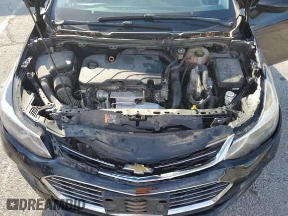 2018 Chevrolet Cruze Premier z VIN 3G1BF6SM1JS615198, wystawiony jako Copart lot #85842965 z przebiegiem 94 370 mil mil oraz Szkoda całkowita • Salvage title. Historia ofert i sprzedaży dostępna na DreamBid. Obrazek 12.