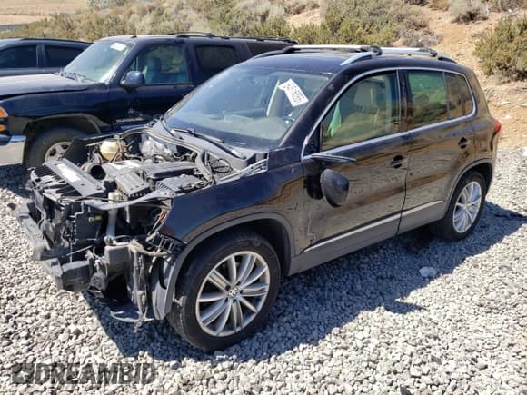 ✅ 2012 Volkswagen Tiguan SE • VIN: WVGBV7AX1CW609366 • Лот: 64516695. Опубликован ранее на Copart с пробегом 118 687 миль. Бесплатный доступ к архиву аукционных продаж из США и подробный отчёт об истории автомобиля на DreamBid. Изображение 1.