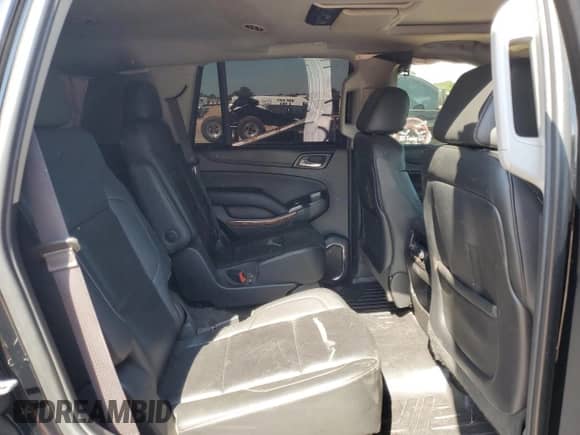 2015 Chevrolet Tahoe LTZ with VIN 1GNSKCKC6FR170659, listed as a Copart auction lot 69412835 with 252,198 mi miles and Salvage title. Bid and sale history available at DreamBid. Image 11.