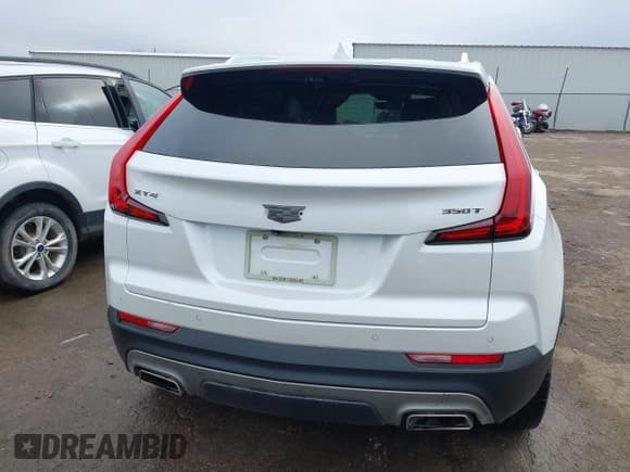 ✅ 2022 Cadillac XT4 FWD Premium Luxury • VIN: 1GYFZCR42NF124440 • Lot: 41183073. Listed on IAAI with 47,763 mi. Free auction sales archive from the USA and detailed vehicle history report at DreamBid. Image 16.