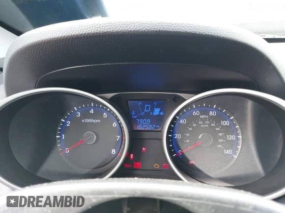 2012 Hyundai Tucson GLS with VIN KM8JU3AC3CU455825, listed as a IAAI auction lot 43611561 with 182,582 mi miles and . Bid and sale history available at DreamBid. Image 7.