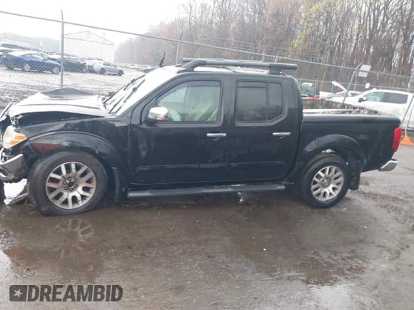 ✅ 2011 Nissan Frontier Pro-4X • VIN: 1N6AD0EV5BC440663 • Lot: 41923918. Listed on IAAI with 168,331 mi. Free auction sales archive from the USA and detailed vehicle history report at DreamBid. Image 14.