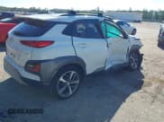 ✅ 2021 Hyundai Kona Limited • VIN: KM8K33A50MU618067 • Лот: 43711190. Опубликован ранее на IAAI с пробегом 51 022 миль. Бесплатный доступ к архиву аукционных продаж из США и подробный отчёт об истории автомобиля на DreamBid. Изображение 4.