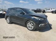 ✅ 2018 Hyundai Santa Fe 2.0T • VIN: 5XYZU4LAXJG548963 • Лот: 82633375. Опубликован ранее на Copart с пробегом 95 041 миль. Бесплатный доступ к архиву аукционных продаж из США и подробный отчёт об истории автомобиля на DreamBid. Изображение 4.
