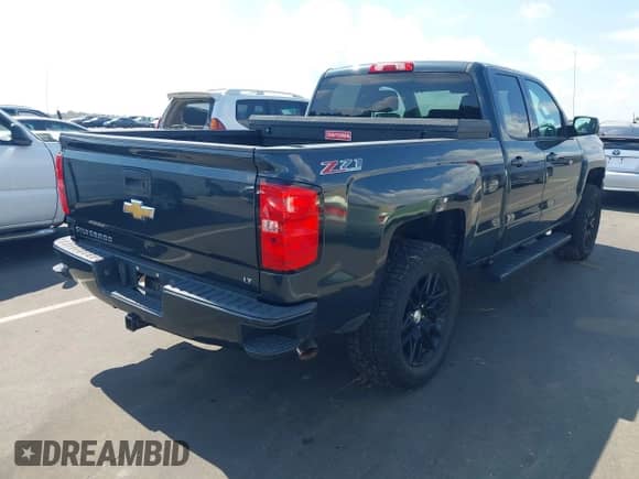 2017 Chevrolet Silverado 1500 LT with VIN 1GCVKREC6HZ229846, listed as a IAAI auction lot 43298428 with 86,125 mi miles and . Bid and sale history available at DreamBid. Image 4.