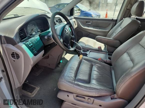 ✅ 2002 Honda Odyssey EX-L • VIN: 2HKRL18972H565259 • Lot: 69419035. Wystawiony na Copart z przebiegiem 290 654 mil. Bezpłatny archiwum sprzedaży aukcyjnych z USA i szczegółowy raport historii pojazdu na DreamBid. Zdjęcie 7.