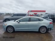 ✅ 2014 Ford Fusion Titanium Hybrid • VIN: 3FA6P0RU8ER350016 • Lot: 43532622. Listed on IAAI with 87,458 mi. Free auction sales archive from the USA and detailed vehicle history report at DreamBid. Image 14.