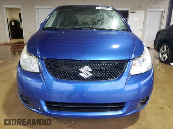 ✅ 2012 Suzuki SX4 LE • VIN: JS2YC5A32C6304258 • Lot: 61793035. Listed on Copart with 66,295 mi. Free auction sales archive from the USA and detailed vehicle history report at DreamBid. Image 5.