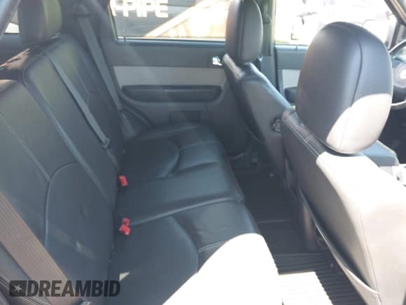 ✅ 2010 Mercury Mariner Premier • VIN: 4M2CN9HG8AKJ18091 • Lot: 42215475. Listed on IAAI with 97,332 mi. Free auction sales archive from the USA and detailed vehicle history report at DreamBid. Image 8.