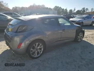 ✅ 2017 Hyundai Veloster • VIN: KMHTC6AD2HU309395 • Lot: 79388454. Wystawiony na Copart z przebiegiem 108 226 mil. Bezpłatny archiwum sprzedaży aukcyjnych z USA i szczegółowy raport historii pojazdu na DreamBid. Zdjęcie 3.