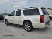 ✅ 2011 Chevrolet Suburban LTZ • VIN: 1GNSCKE0XBR275319 • Lot: 63765554. Wystawiony na Copart z przebiegiem 215 494 mil. Bezpłatny archiwum sprzedaży aukcyjnych z USA i szczegółowy raport historii pojazdu na DreamBid. Zdjęcie 2.