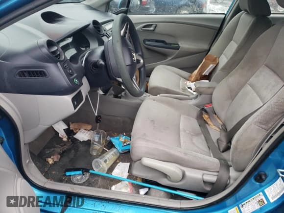 ✅ 2010 Honda Insight EX • VIN: JHMZE2H79AS017003 • Lot: 87313754. Listed on Copart with 159,936 mi. Free auction sales archive from the USA and detailed vehicle history report at DreamBid. Image 7.