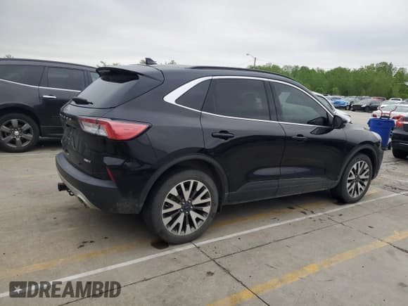 ✅ 2020 Ford Escape Titanium • VIN: 1FMCU9J9XLUA29209 • Lot: 54379545. Listed on Copart with 75,412 mi. Free auction sales archive from the USA and detailed vehicle history report at DreamBid. Image 3.