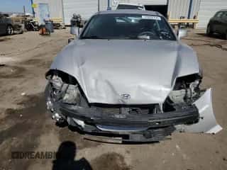 2006 Hyundai Tiburon GT z VIN KMHHN65F76U190851, wystawiony jako Copart lot #45935795 z przebiegiem 102 335 mil mil oraz Szkoda całkowita • Salvage title. Historia ofert i sprzedaży dostępna na DreamBid. Obrazek 5.