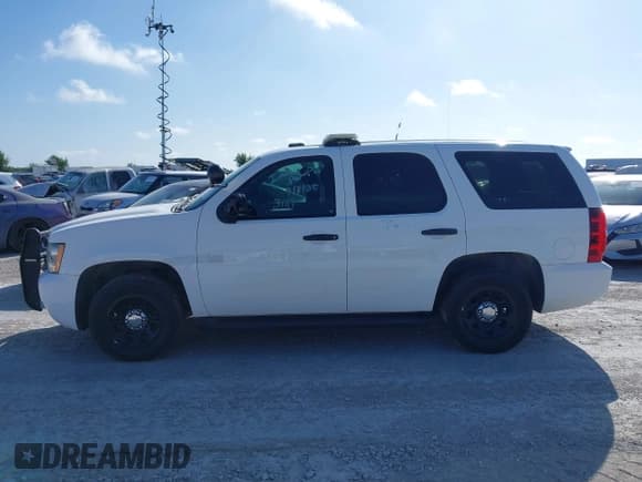 ✅ 2014 Chevrolet Tahoe Commercial • VIN: 1GNLC2E06ER193189 • Lot: 42672382. Listed on IAAI with 78,402 mi. Free auction sales archive from the USA and detailed vehicle history report at DreamBid. Image 14.