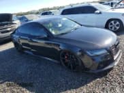 ✅ 2015 Audi RS 7 Prestige • VIN: WUAW2AFC0FN900875 • Лот: 82953404. Опубликован ранее на Copart с пробегом 68 800 миль. Бесплатный доступ к архиву аукционных продаж из США и подробный отчёт об истории автомобиля на DreamBid. Изображение 4.