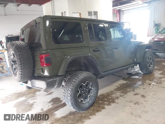 ✅ 2023 Jeep Wrangler Rubicon • VIN: 1C4JJXR68PW584575 • Лот: 41391275. Опубликован ранее на IAAI с пробегом 38 122 миль. Бесплатный доступ к архиву аукционных продаж из США и подробный отчёт об истории автомобиля на DreamBid. Изображение 4.