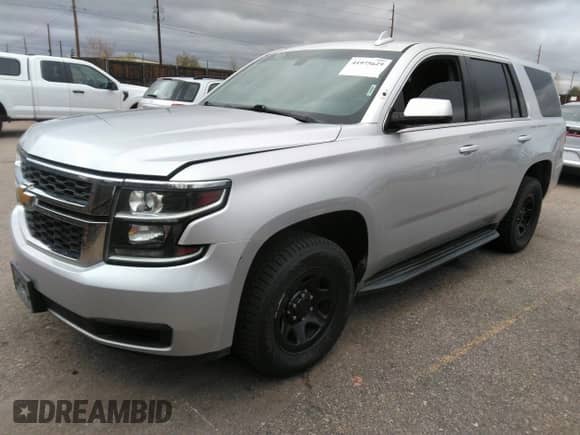 2016 Chevrolet Tahoe Commercial with VIN 1GNSKDEC5GR368328, listed as a IAAI auction lot 41975629 with 104,205 mi miles and . Bid and sale history available at DreamBid. Image 2.