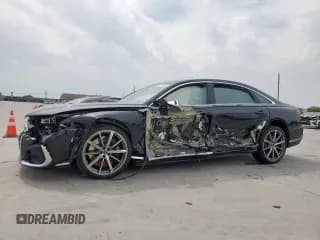 ✅ 2023 Audi S8 • VIN: WAULSAF81PN002747 • Лот: 57333525. Опубликован ранее на Copart с пробегом 61 713 миль. Бесплатный доступ к архиву аукционных продаж из США и подробный отчёт об истории автомобиля на DreamBid. Изображение 1.