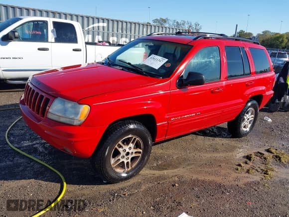 ✅ 2000 Jeep Grand Cherokee Limited • VIN: 1J4G258N3YC119512 • Lot: 43611347. Listed on IAAI with 219,412 mi. Free auction sales archive from the USA and detailed vehicle history report at DreamBid. Image 2.