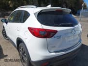 ✅ 2016 Mazda CX-5 Grand Touring • VIN: JM3KE4DY8G0908425 • Lot: 43350691. Wystawiony na IAAI z przebiegiem 144 684 mil. Bezpłatny archiwum sprzedaży aukcyjnych z USA i szczegółowy raport historii pojazdu na DreamBid. Zdjęcie 3.