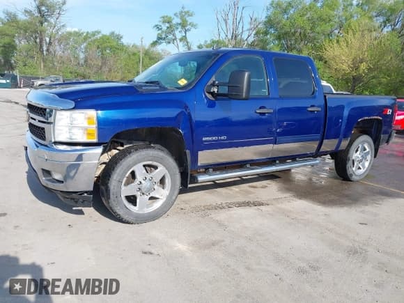 ✅ 2013 Chevrolet Silverado 2500HD LT • VIN: 1GC1KXCG1DF130999 • Lot: 42080914. Listed on IAAI with 366,141 mi. Free auction sales archive from the USA and detailed vehicle history report at DreamBid. Image 2.