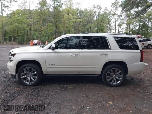 ✅ 2015 Chevrolet Tahoe LTZ • VIN: 1GNSKCKC2FR169461 • Lot: 43446307. Listed on IAAI with 237,568 mi. Free auction sales archive from the USA and detailed vehicle history report at DreamBid. Image 14.