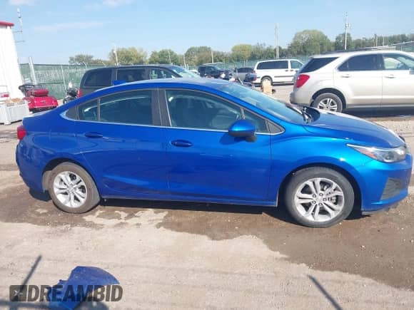 2019 Chevrolet Cruze LT with VIN 1G1BE5SM4K7108535, listed as a IAAI auction lot 43352905 with 102,584 mi miles and . Bid and sale history available at DreamBid. Image 13.