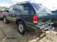 2002 Chevrolet Blazer LS z VIN 1GNCT18W52K187799, wystawiony jako Copart lot #73642634 z przebiegiem Nie podano mil oraz Szkoda całkowita • Salvage title. Historia ofert i sprzedaży dostępna na DreamBid. Obrazek 2.