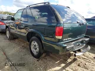 2002 Chevrolet Blazer LS z VIN 1GNCT18W52K187799, wystawiony jako Copart lot #73642634 z przebiegiem Nie podano mil oraz Szkoda całkowita • Salvage title. Historia ofert i sprzedaży dostępna na DreamBid. Obrazek 2.