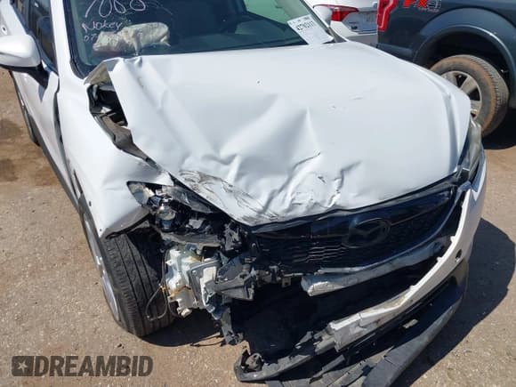 ✅ 2015 Mazda CX-5 Grand Touring • VIN: JM3KE2DY3F0487068 • Lot: 42702113. Wystawiony na IAAI z przebiegiem 110 989 mil. Bezpłatny archiwum sprzedaży aukcyjnych z USA i szczegółowy raport historii pojazdu na DreamBid. Zdjęcie 6.