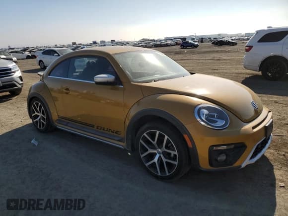 ✅ 2016 Volkswagen Beetle Dune • VIN: 3VWS17AT8GM621269 • Lot: 47991993. Listed on Copart with 51,741 mi. Free auction sales archive from the USA and detailed vehicle history report at DreamBid. Image 4.
