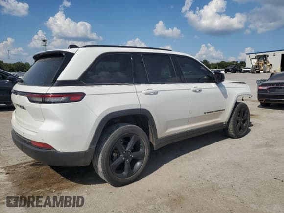 ✅ 2023 Jeep Grand Cherokee Altitude • VIN: 1C4RJGAG5PC510037 • Lot: 69645445. Listed on Copart with 59,419 mi. Free auction sales archive from the USA and detailed vehicle history report at DreamBid. Image 3.