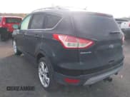 ✅ 2013 Ford Escape Titanium • VIN: 1FMCU9J9XDUD22920 • Lot: 43776015. Wystawiony na IAAI z przebiegiem 143 460 mil. Bezpłatny archiwum sprzedaży aukcyjnych z USA i szczegółowy raport historii pojazdu na DreamBid. Zdjęcie 3.