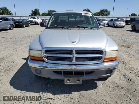 2004 Dodge Dakota SLT with VIN 1D7HL48K44S780575, listed as a Copart auction lot 57872335 with 148,785 mi miles and Salvage title. Bid and sale history available at DreamBid. Image 5.
