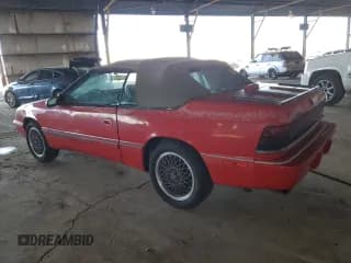 ✅ 1990 Chrysler LeBaron • VIN: 1C3XJ45J9LG405682 • Lot: 48690985. Wystawiony na Copart z przebiegiem 75 714 mil. Bezpłatny archiwum sprzedaży aukcyjnych z USA i szczegółowy raport historii pojazdu na DreamBid. Zdjęcie 2.