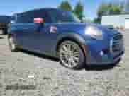 2014 MINI Hardtop S with VIN WMWXM7C51ET926090, listed as a Copart auction lot 55958745 with 148,997 mi miles and Salvage title. Bid and sale history available at DreamBid. Image 4.