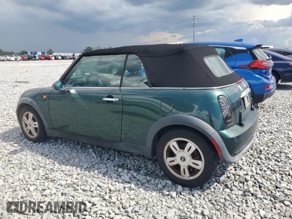 ✅ 2007 MINI Convertible • VIN: WMWRF335X7TG16568 • Лот: 66146885. Опубликован ранее на Copart с пробегом 97 502 миль. Бесплатный доступ к архиву аукционных продаж из США и подробный отчёт об истории автомобиля на DreamBid. Изображение 2.