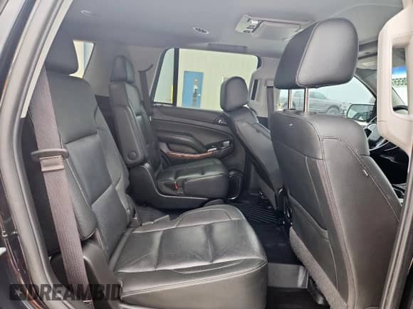 2020 Chevrolet Tahoe Premier z VIN 1GNSCCKC8LR188993, wystawiony jako Copart lot #60122655 z przebiegiem 103 415 mil mil oraz Czysty tytuł • Clean title. Historia ofert i sprzedaży dostępna na DreamBid. Obrazek 11.