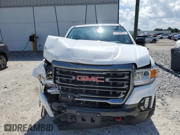 ✅ 2021 GMC Canyon 4WD AT4 • VIN: 1GTG6FEN4M1142856 • Лот: 67096815. Опубликован ранее на Copart с пробегом 12 090 миль. Бесплатный доступ к архиву аукционных продаж из США и подробный отчёт об истории автомобиля на DreamBid. Изображение 5.